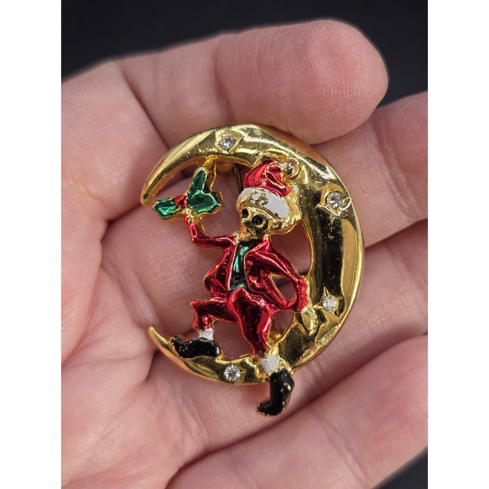 vintage gold-tone and rhinestone Christmas Santa Claus in a crescent moon brooch
